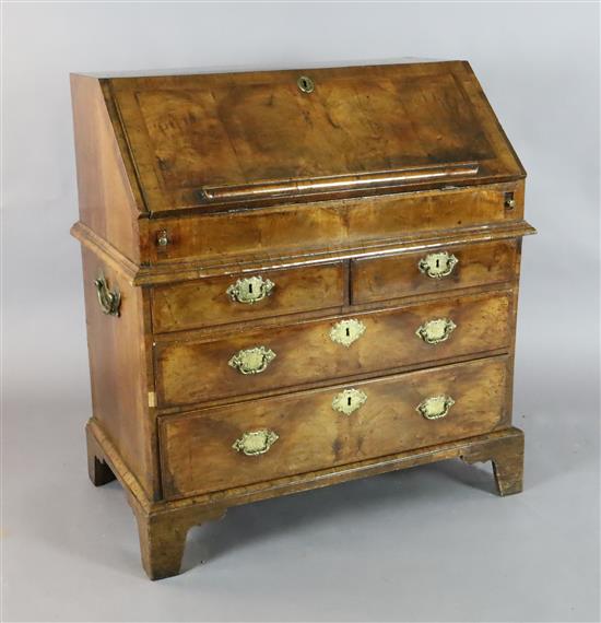 A mid 18th century featherbanded walnut bureau, W.3ft 1in. D.1ft 10in. H.3ft 4in.